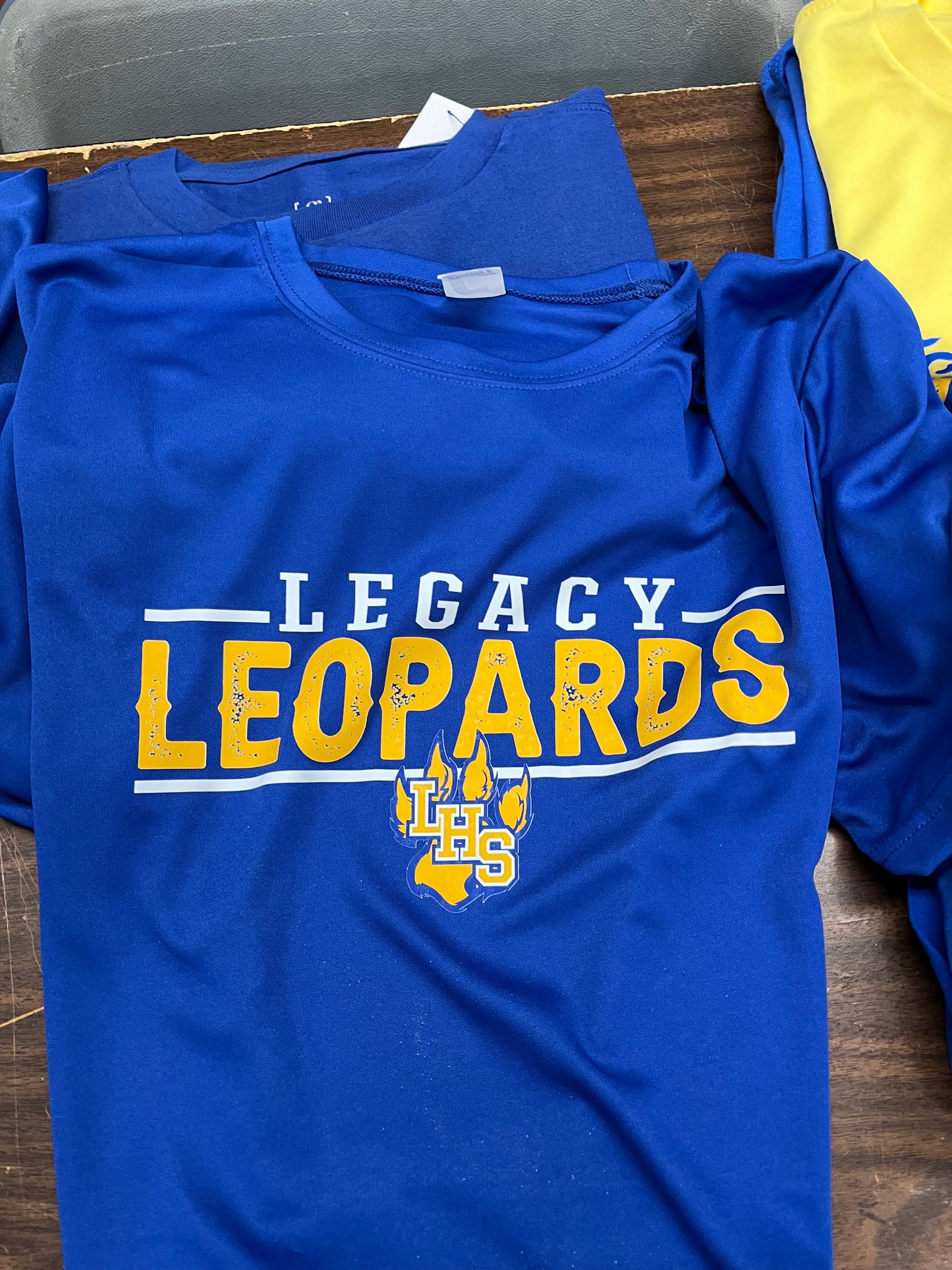 Legacy leopards with paw only soft style shirts